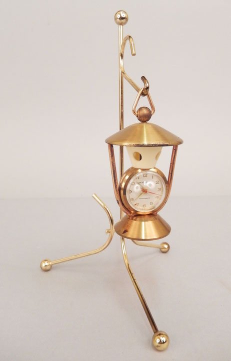 Chesterfield desk clock: Chesterfield desk clock, shape of a lantern on a post, face marked Chesterfield Antimagnetic, verso displays the temperature, marked on bottom "Model 'Art, Made in France", clock measures 3 3/8" high