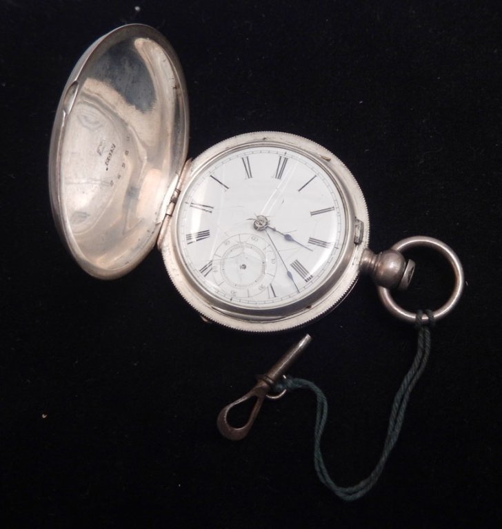 M.I. Tobias coin silver pocket watch: M.I. Tobias & Co. key wind English coin silver pocket watch with hunter case, porcelain dial, Roman numerals and sunken sub seconds register, case measures approximately 54mm across, stamped COIN with