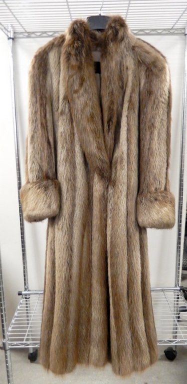 Phil M. Stupp unsheared beaver fur full length coat: Phil M. Stupp unsheared beaver fur full length coat, label for Phil M. Stupp Furs, embroidered Marjorie Manoff, has an interior pocket, shoulder to shoulder 20", shoulder to cuff 23", and collar to bo