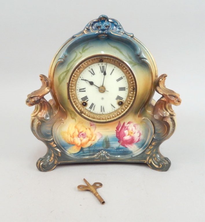 Royal Bonn cased Ansonia mantle clock: Royal Bonn cased Ansonia mantle clock, with pendulum and key, 11 5/8" high