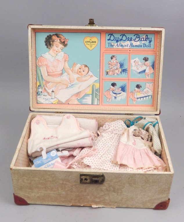 Grouping of doll clothes in Dy-Dee doll trunk (1 of 6)