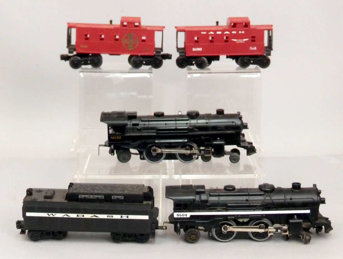 Lionel postwar O gauge Wabash cars: Lionel postwar O gauge Wabash cars, includes No. 8604 steam locomotive and Wabash tender, No. 16505 Wabash caboose, and Lionel No. 8632 steam locomotive, No. 6430 Santa Fe caboose