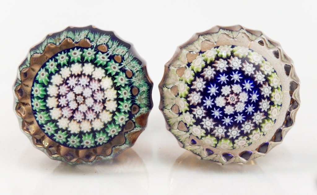 Two Perthshire millefiori door knobs: Two Perthshire millefiori art glass door knobs, centric millefiori design, center signature P cane surrounded by four rings of canes, one knob's ring colors are white, pink, white, and green, other kn