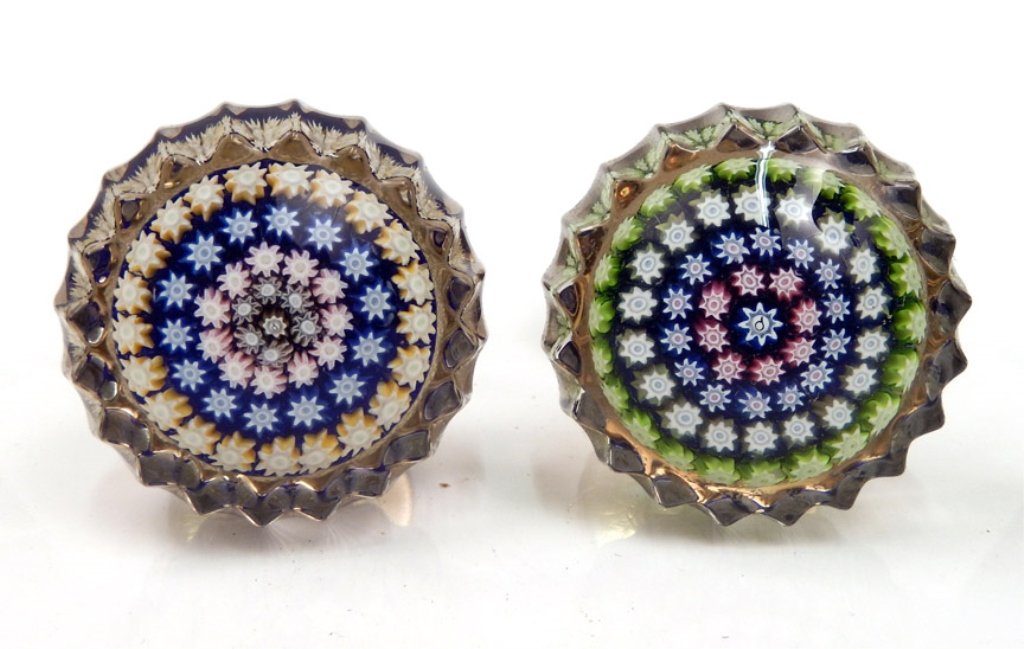 Two Perthshire millefiori door knobs: Two Perthshire millefiori art glass door knobs, centric millefiori design, center signature P cane surrounded by four rings of canes, one knob's ring colors are red, blue, white, and green, other knob
