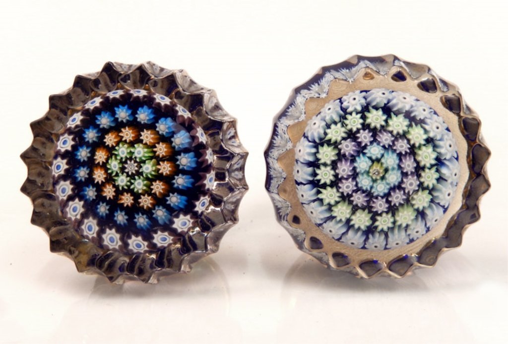 Two Perthshire millefiori door knobs: Two Perthshire millefiori art glass door knobs, centric millefiori design, center signature P cane surrounded by four rings of canes, one knob's ring colors are light blue, purple, green, and light bl
