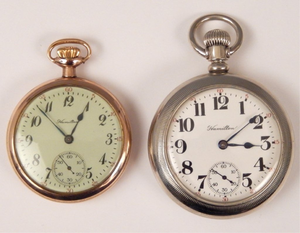Two Hamilton railroad pocket watches: Two Hamilton pocket watches including one Hamilton 924 silverine, stem wind, open face, railroad pocket watch, size 18s, 17 jewels with white enamel dial, Arabic numerals, blue hands and sunken sub se