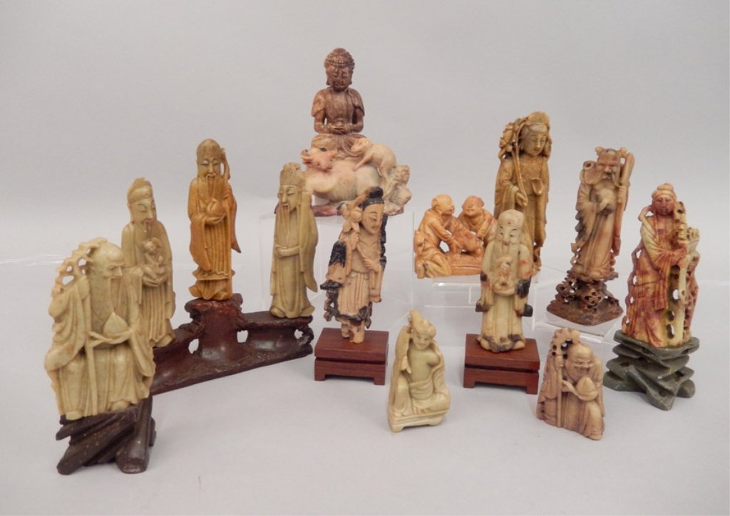 Grouping of Chinese soapstone figurines: Grouping of Chinese soapstone figurines, fourteen total, one has three on a platform, measures 6 3/4" x 6" x 1 5/8"