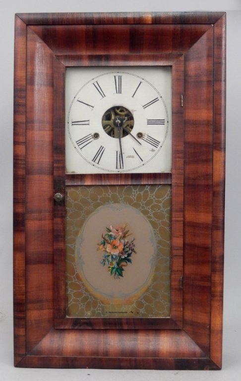 Ansonia Ogee clock: Ansonia Ogee clock, painted wooden dial with Roman numerals, floral reverse painted glass panel, interior paper label, with pendulum and two weights, label from Golden Time" for 1990-'92 work, 25 3/4"