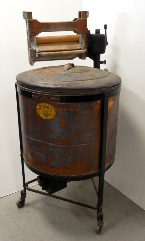 Judson Burns copper wringer washing machine: Judson C. Burns copper wringer washing machine, "Easy Vacuum Electric Washer", Syracuse Washing Machine Corp., with hose and interior works, 51 1/2" x 27" diameter