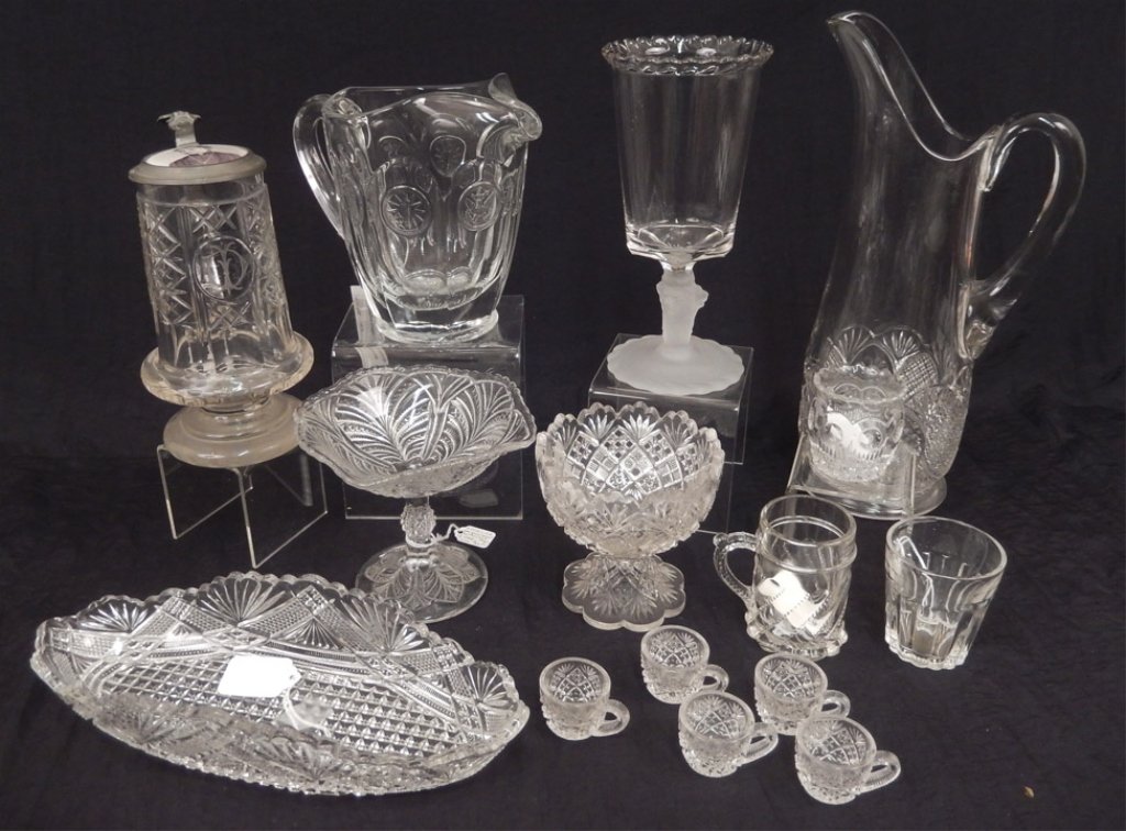 Grouping of glassware: Grouping of glassware, includes classic flower pineapple pattern glass pitcher, ca. 1900, 13 1/8", crystal pitcher with torch and eagle medallions, 6 1/2", child's "Rea" pattern glass mug by Beatty Gl