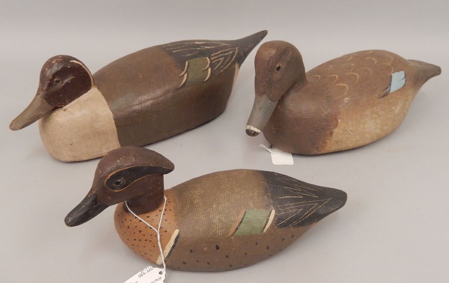 Three wooden decoys by R.W. Schaap: Three wooden decoys by R.W. Schaap, includes green wing teal male, 5" x 11" x 4", pintail male decoy, 5 1/2" x 17 1/4" x 5 5/8", and a ring neck decoy, 6 1/8" x 14" x 5 1/2", all signed on bottom