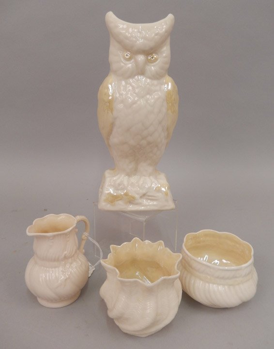 Four pieces of Belleek: Four pieces of Belleek, includes owl vase, brown mark, 8 1/2", creamer and sugar bowl set, ribbon design, green mark, 3 3/8" and 2 1/4", and a small shell pattern bowl, ca. 1940's, green mark, 2 1/2"