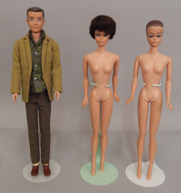 Two early Barbie dolls and Ken doll: Two early Barbie dolls and Ken doll, includes 1962 Fashion Queen Barbie, (no wigs), Bubble Cut Barbie, and 1962 Crew Cut Ken, marked Mattel Hawthorne