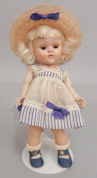 1952 Vogue strung Ginny, all original: 1952 Vogue strung Ginny, all original, hard plastic, wearing blue and white striped dress, underwear, matching hat, blue center snap shoes, and socks, marked Vogue Dolls on back, 8" tall