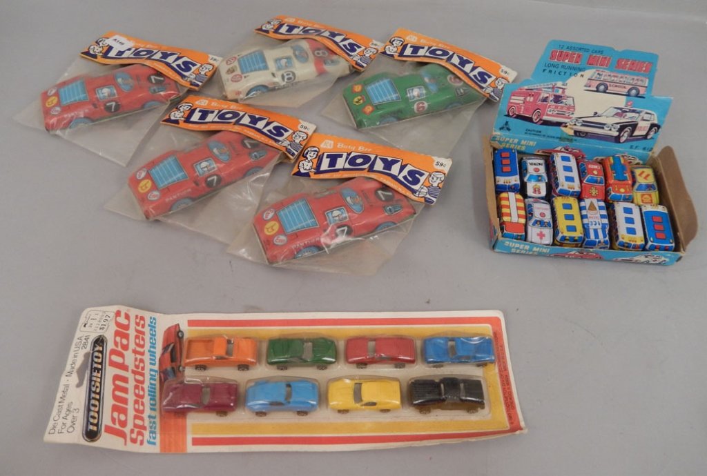 Collection of tin toy cars in packages (1 of 6)