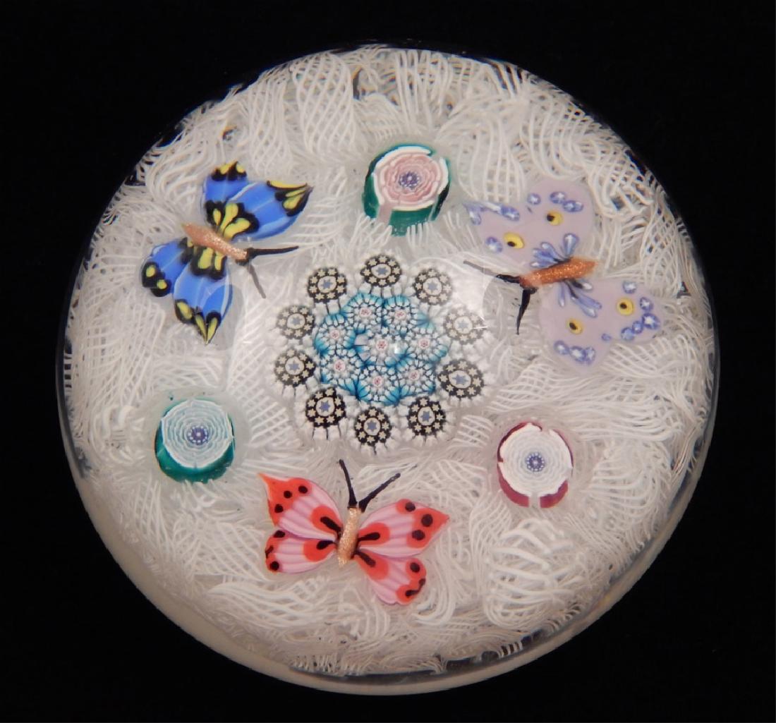 John Deacons art glass paperweight: John Deacons art glass paperweight, lampwork three butterflies on a white muslin ground separated by three Clichy roses, center of complex canes in turquoise and black star canes, paper label on botto