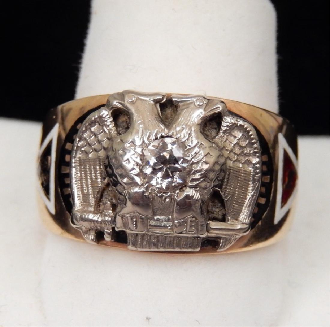 10k gold Masonic ring: 10k white and yellow gold Masonic 32nd degree ring with double headed eagle, flush-set diamond and polychrome enameling, size 9, stamped 10k, weighs 9.0 gr/5.8 dwt complete, mid 20th C.