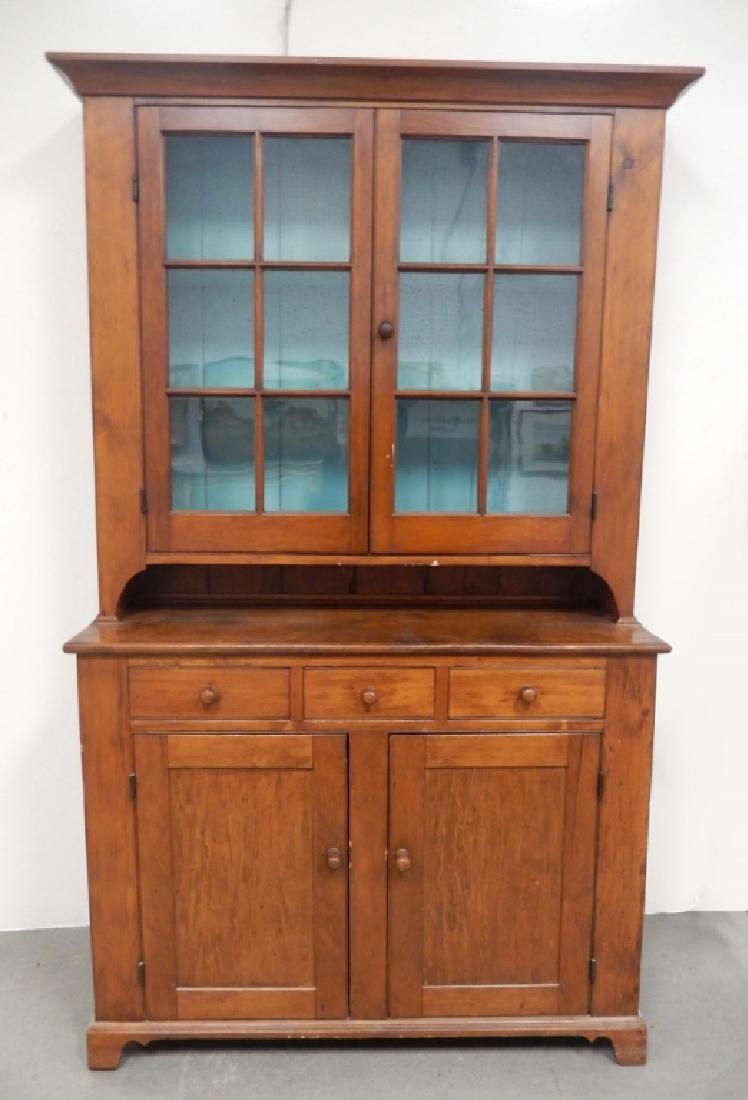 Poplar hutch: Poplar hutch, overhanging cornice over a pair of glass doors, above pie shelf, lower section had three short drawers over a pair of recessed paneled doors, bracket feet, 84 1/2" x 49 1/2" x 18"