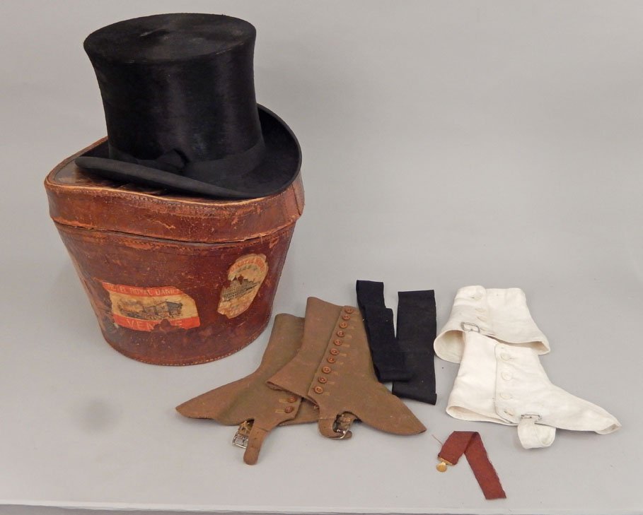 Silk plush top hat in leather custom's case with acces: Silk plush top hat in leather custom's case with accessories, label inside hat "Manufactured Expressly For J.W. Watson, Hatter, 9, Wood Street, Wakefield", in fitted leather case with quilted satin in