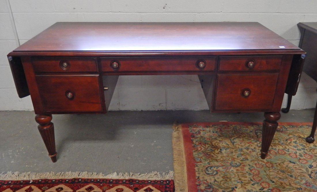 Cherry Ethan Allen dropleaf executive desk: Cherry Ethan Allen drop-leaf executive desk, locking file drawer, Ethan Allen branding in drawer, 20th C., 30" high x 61 1/2" x 29 1/2"