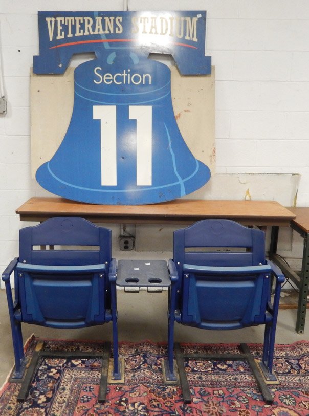 Veteran's Stadium sign and Citizen's Park stadium seat: Veteran's Stadium Section 11 aluminum sign and Citizen's Bank Park stadium seats prototype, sign measures 52" x 48", one sided, seats prototype 31" x 55 1/2" x 21"