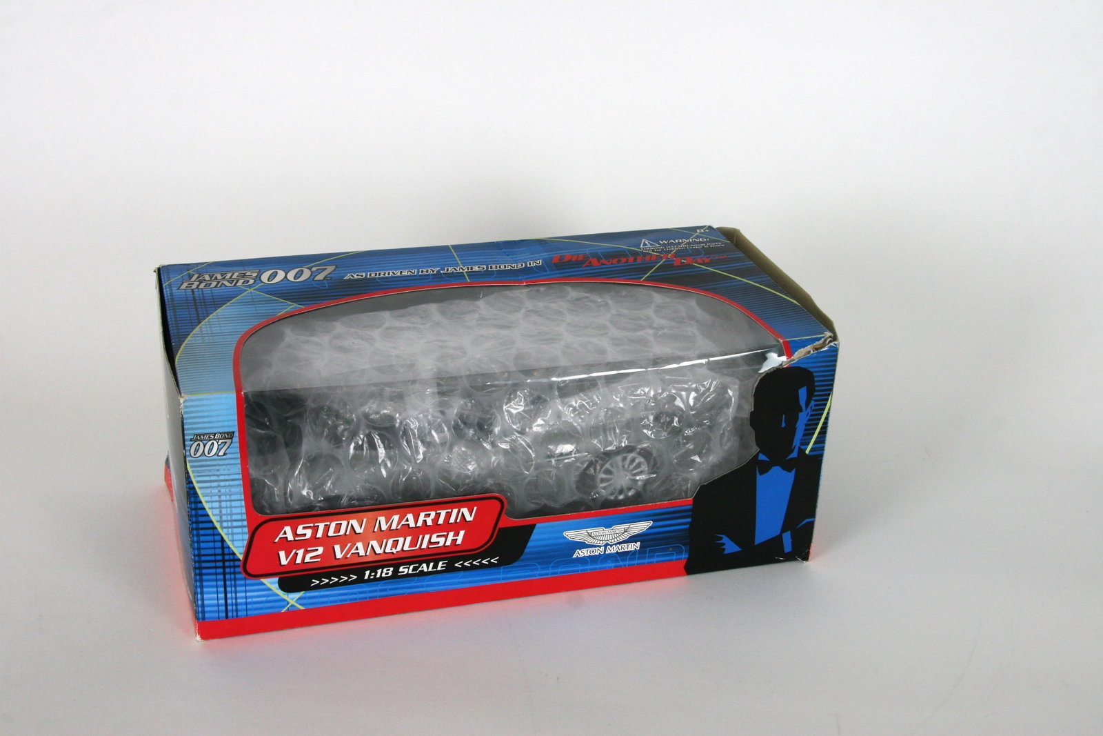 Aston Martin V12 Vanquish James Bond 1:18 model: Model has been removed from box for display but is in excellent condition.