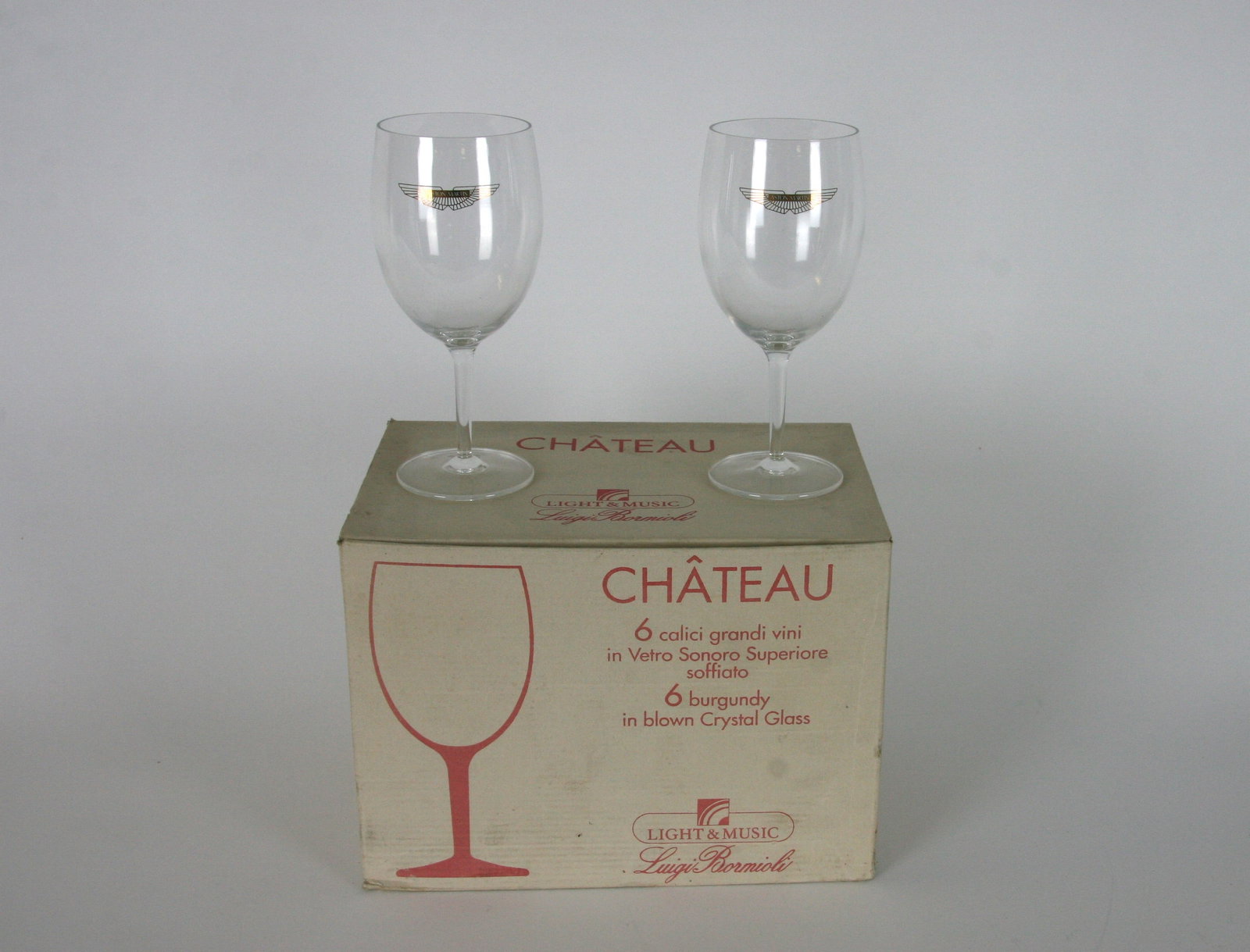 Set of 6 Burgundy Aston Martin wine glasses: New old stock meaures 26cm x 19cm x 18cm boxed