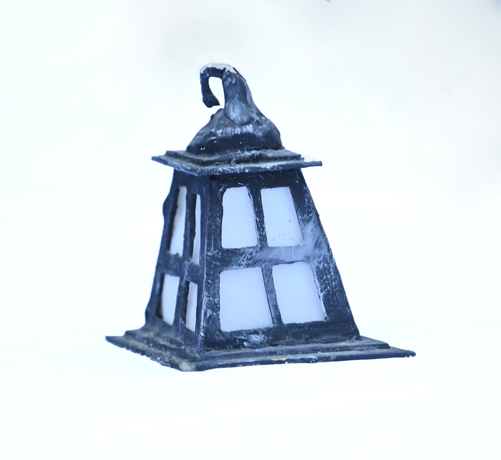 The Nightmare Before Christmas (1993) – Screen-matched Halloween Town Lamp: A screen-matched Halloween Town lamp from Henry Selick's stop-motion fantasy musical The Nightmare Before Christmas. This custom-crafted miniature lamp was positioned in Halloween Town and can be seen