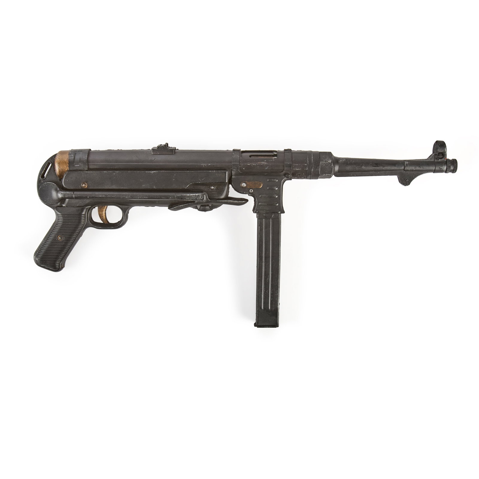 MP40 Prop from Raiders of the Lost Ark: Production used MP40 prop constructed of cast foam latex and hard rubber over internal armature, expertly studio painted. The MP40 submachine gun is visible in production used by all the bad guys, inc