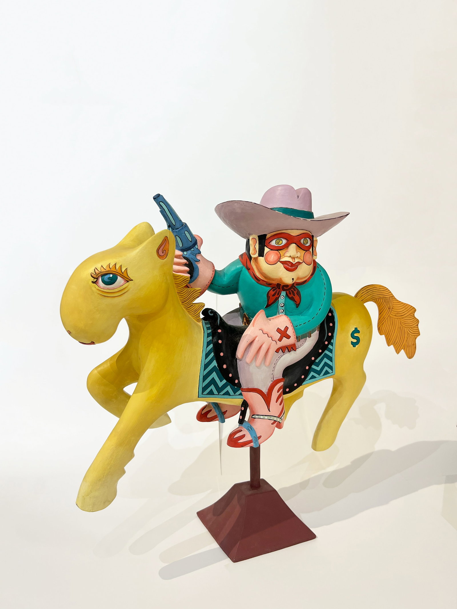 Rick Lowenkamp "Cowboy": 1987. Wood sculpture. 19.5 x 24 x 7 inches.