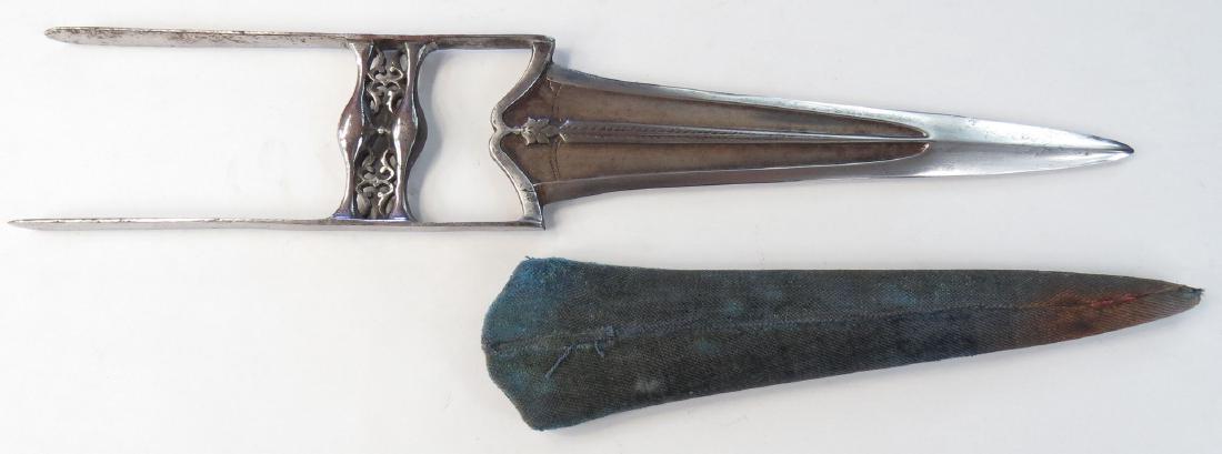 AN INDIAN KATAR DAGGER: Elegantly wrought of steel, the grip pierced and profiled with sprigs, blade finely wrought of wootz, with deep fullers and central rib chiseled with tree of life motif, and heavy armor-piercing tip. 