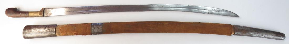 A RARE AFGHAN SABER: Showing influence from the Cossack shashka, the wooden grips with large pommel and brass bolster, the heavy, single-edged blade fullered, with back edge, struck at the forte with Afghan Royal Armory a