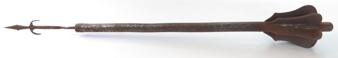 A RARE SUDANESE MACE: Wrought entirely of steel, with broad, profiled flanges, shaft and terminal spike, inlaid in silver. Latter 19th century. Of a type used at Omdurman. Well worn. Overall length 72.5cm. Condition II