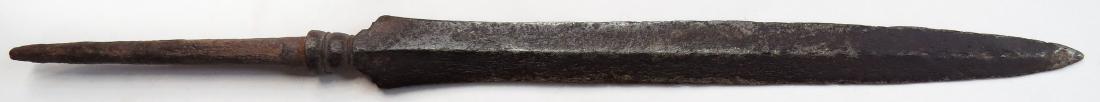 AN INDONESIAN SPEARHEAD: Well-wrought in characteristic form. 18th c. Corrosion. Overall length 37.4cm. Condition V