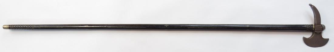 A HUNGARIAN FOKOS AXE: A fine example, the well-wrought steel head dated 1848 with Hungarian crest, on its ebony haft with silver stud decorations. Dated 1848. Minor wear. Overall length 85cm. Condition III