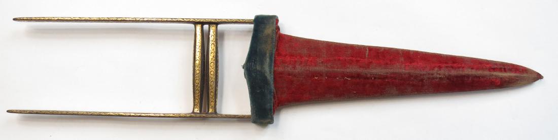 AN INDIAN KATAR DAGGER: A fine example, the hilt heavily embellished overall with gold in fine and complex intertwining vegetal motifs, the blade forged of fine silver-gray wootz damascus steel with pronounced central rib de