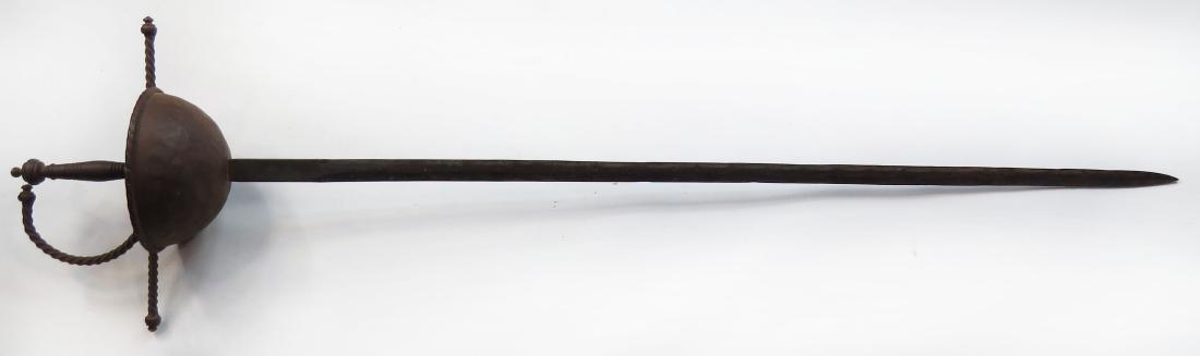 A VINTAGE CUPHILT RAPIER: Spanish, with cuphilt and double-edged blade. 20th century. As found. Overall length 103.5 cm. Condition IV