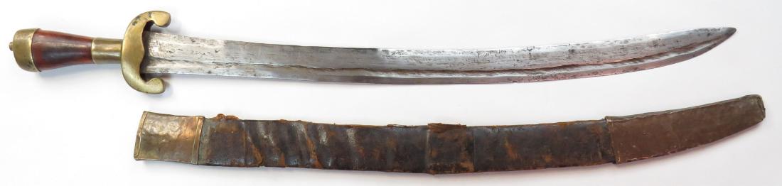A RARE WEST AFRICAN SABER SWORD (1 of 4)