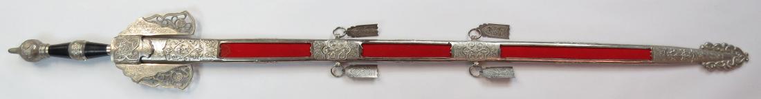 A RARE BOABDIL-STYLE TOLEDO SWORD: Made by Toledo craftsmen, and based closely upon the sword of the last Muslim ruler of Granada, Muhammad XII, known as Boabdil (1460-1533.) The grips of polished horn, the mounts elaborately engraved,