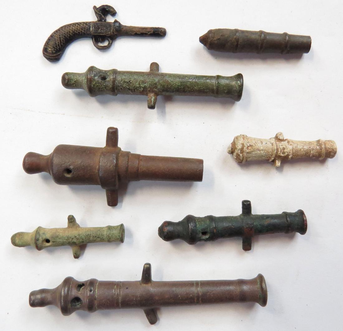 A COLLECTION OF 7 BLACK POWDER TOY CANNON