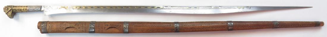 A FINE ALGERIAN FLYSSA SWORD (1 of 5)