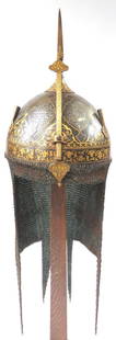 A FINE PERSIAN KULA KHUD HELMET: A rarely-encountered example dating to the Safavid Dynasty. The bowl of deep hemispherical form, wrought of intricately-patterned Persian wootz, set with a pair of plumeholders, an adjustable nasal an