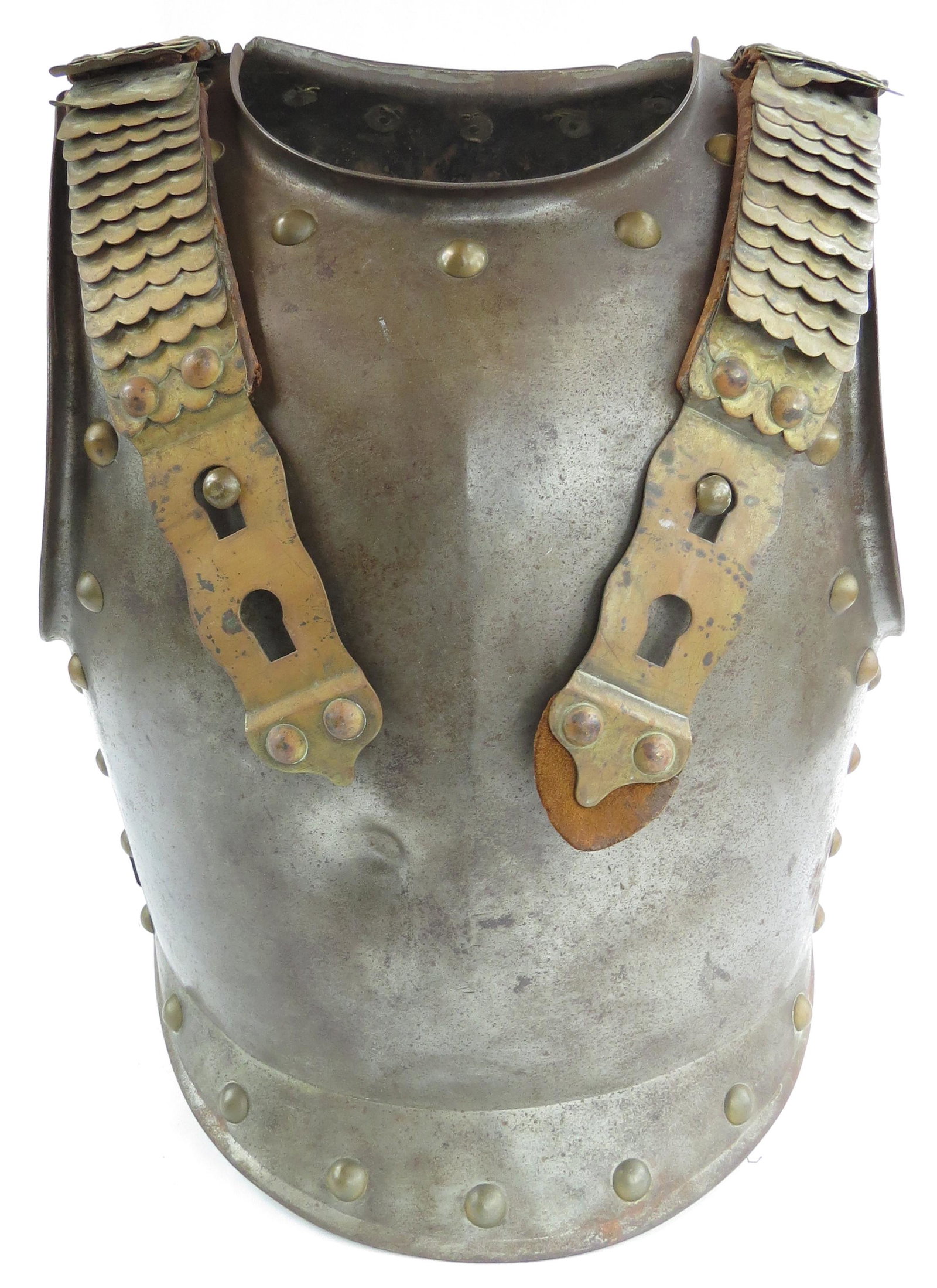 A RARE BAVARIAN CUIRASSIER’S BREAST AND BACKPLATE: Of steel, with raised neck and arm apertures, and bordered with brass studs, the breastplate is of considerable weight and thickness and bears a proof mark. With complete chains, tabs and lining with 