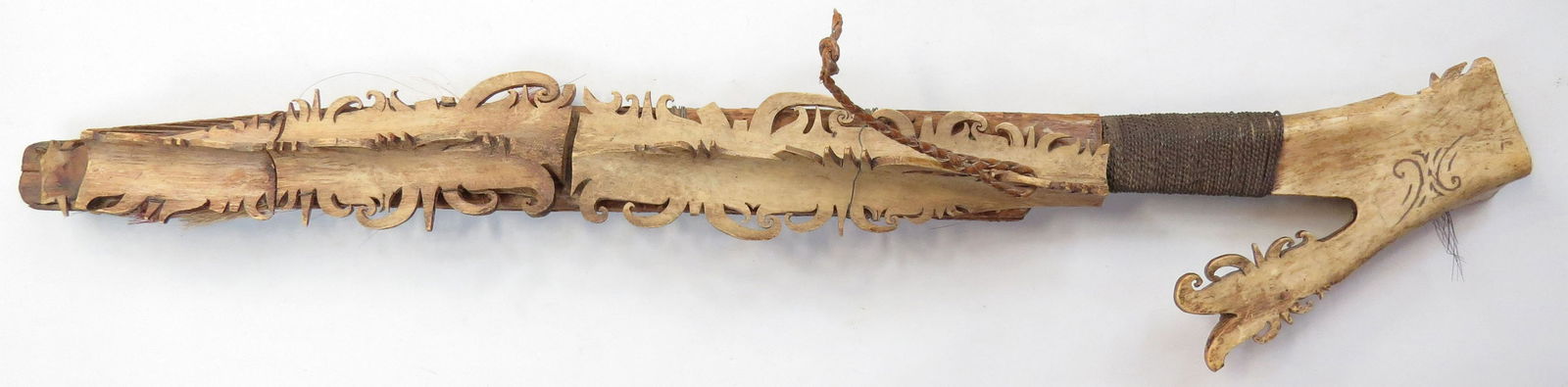 A DAYAK HEADHUNTER MANDAU SWORD (1 of 3)