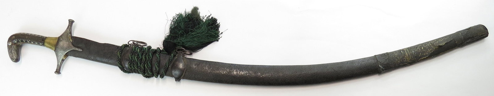 A SYRIAN BEDOUIN SHAMSHIR SWORD: A classic form produced in Damascus, with steel pommel and horn grips set with studs and brass wire wrap to base, with steel guard. The broad, pattern-welded damascus heirloom blade wrought with doubl