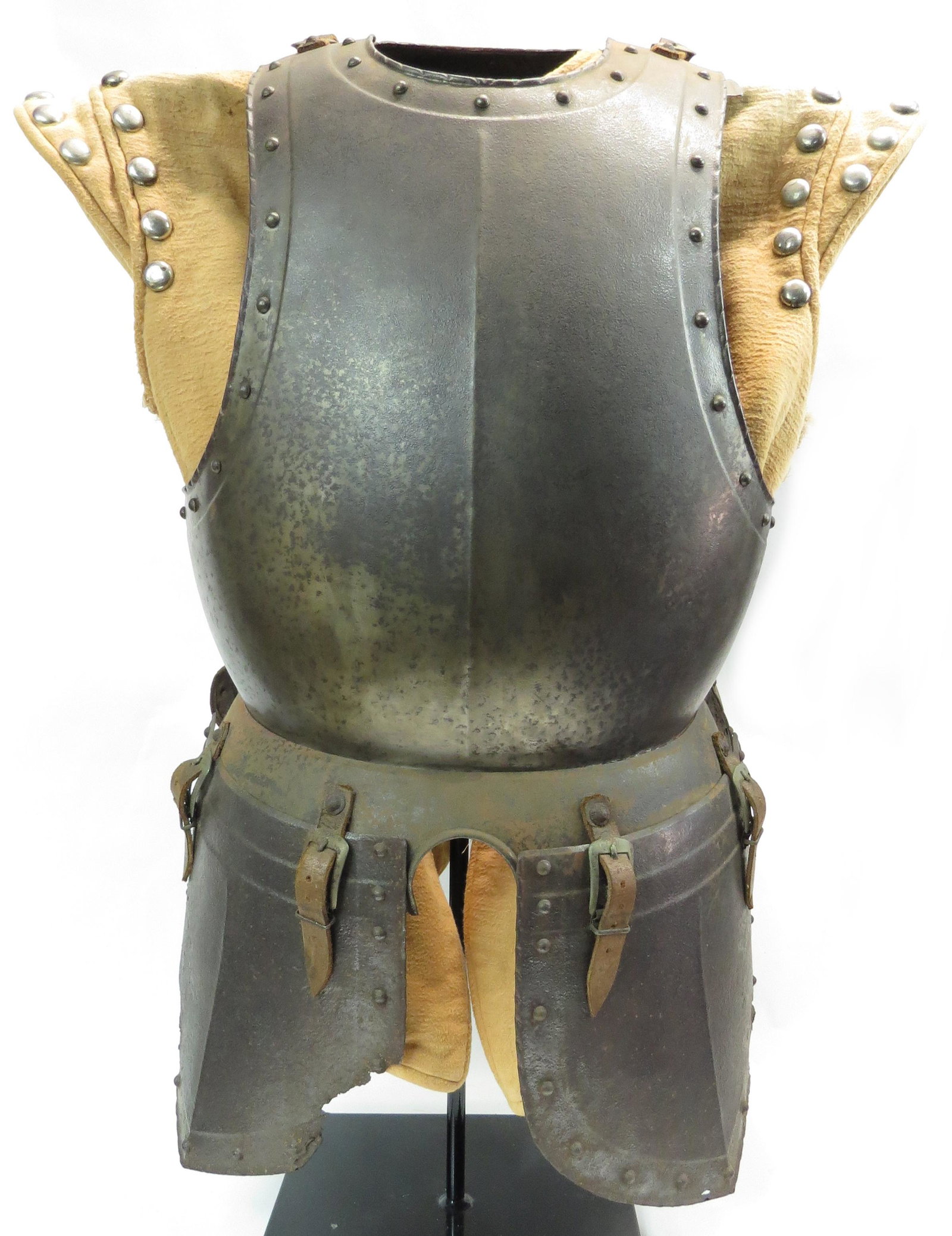 A GEORGIAN-ERA PART ARMOR: Comprising a 16th-century style breast and backplate, fauld and tassets. All with roped borders. Second quarter of the 20th century. Rust and corrosion. Overall height 88.4cm. Condition IV Stand and T