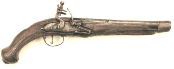 A Flintlock Pistol Made for the Eastern Market: The walnut stock with carved motifs and elegant iron mounts, the French-style flintlock and triggerguard engraved overall. Stepped octagonal barrel struck at the breach with four maker's marks, possib