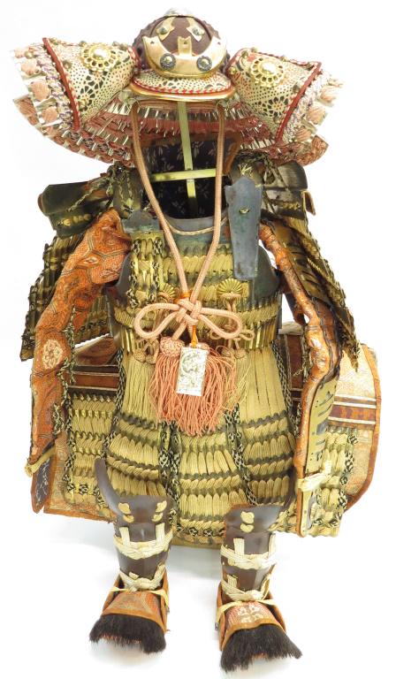A MINIATURE JAPANESE ARMOR: Made for Tango No Sekku, or Boy’s Day Celebration, a superbly constructed and detailed suit.First half of the 20th century. Overall height 18cm. Condition II