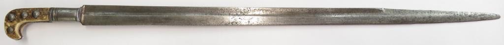 A RARE GERMAN HUNTING SWORD: An earlier example than usually encountered, popular for protection as well. The hooked antler grips retained by four large iron bosses, the tangband well-profiled, with oval ferrule. The robust strai