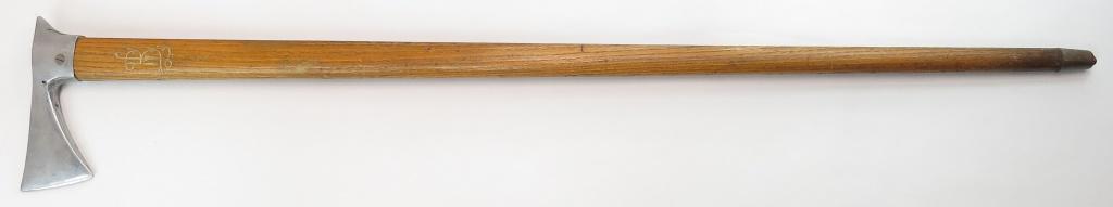 A HUNGARIAN FOKOS AXE: Dating to the WWII era, with aluminum head on hardwood haft with chape intact. With gilded monogram. Overall length 90.5cm. Condition II